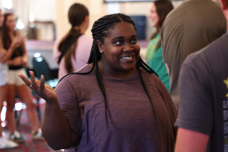 A Spiritual Life staff member speaking with a student